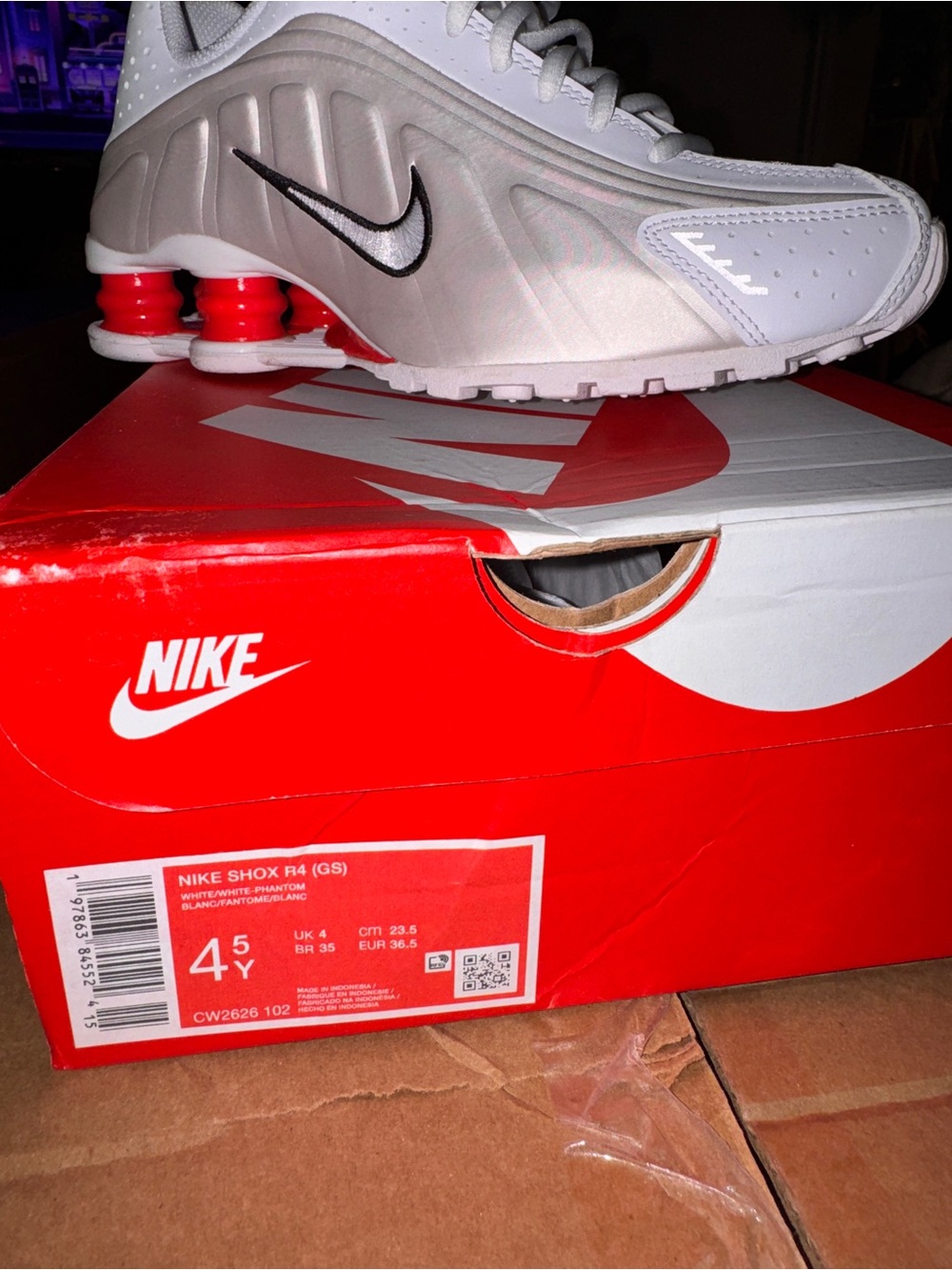 Nike Shox R4 Sneakers - White with Red Accents and Black Swoosh